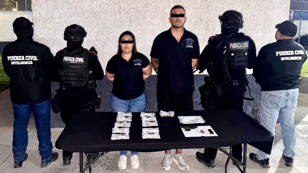 Detienen a pareja armada con $536 mil pesos en Zuazua NL